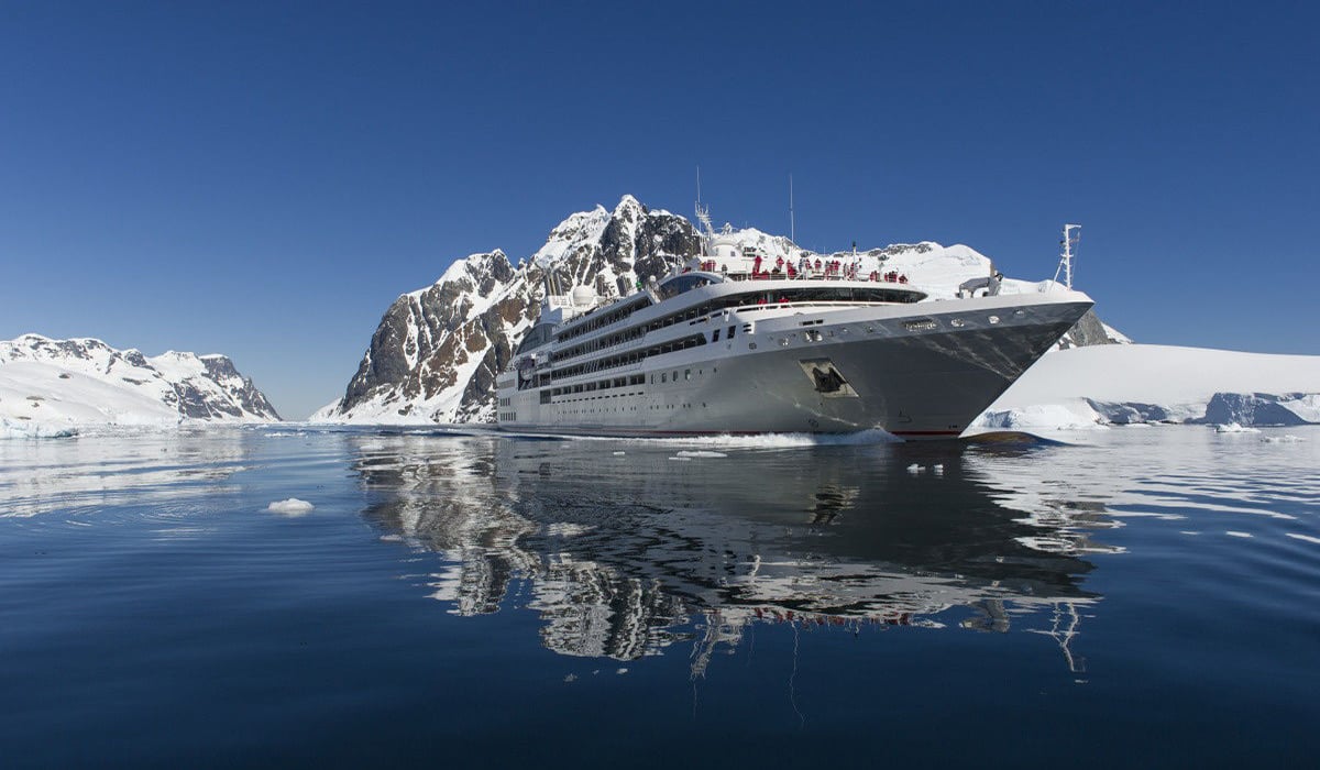 Ponant Cruise Ship at Sea and Icebergs 