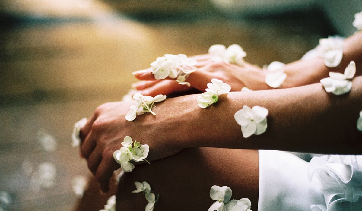 Spa flowers on arms and hands