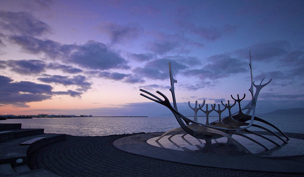 Sun Voyager (Icelandic: Sólfar) is a sculpture by Jón Gunnar Árnason purple sunset