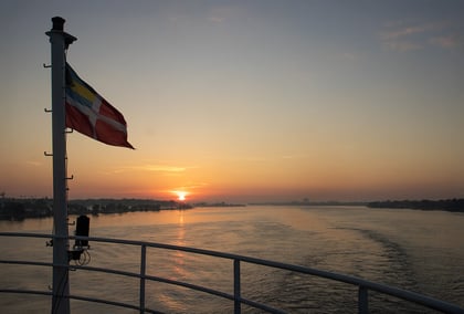 sunrise deck flag on the river