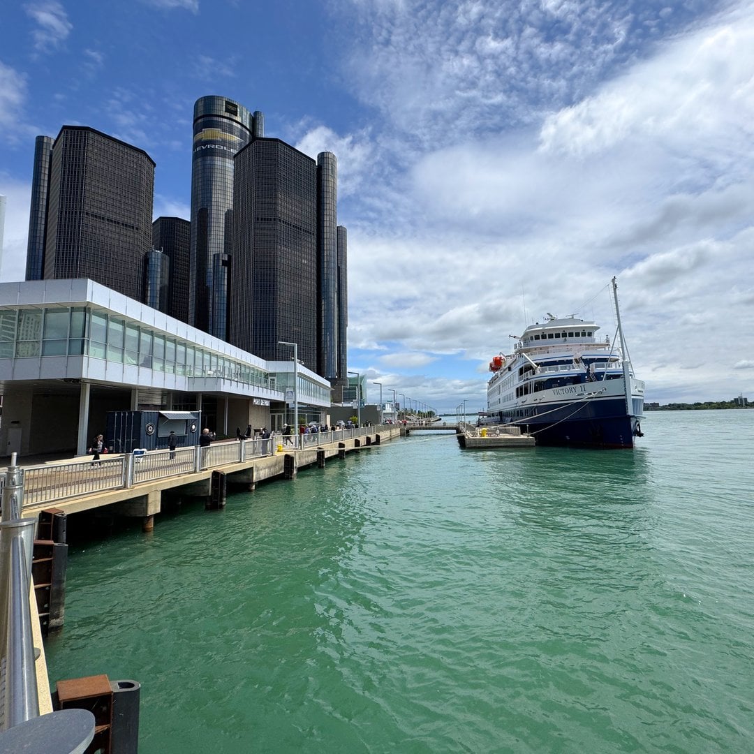 Victory II docked on the Detroit riverfront below the Renaissance Center