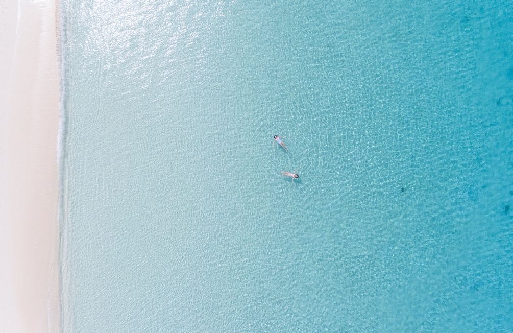 People Swimming in Crystal Clear Water of Grand Cayman