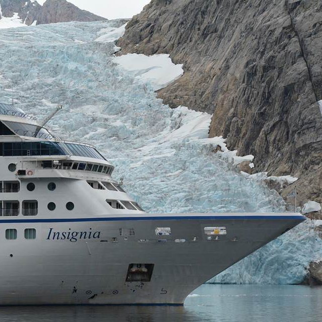 Oceania Cruise Ship Insignia in Alaska Next to Ice