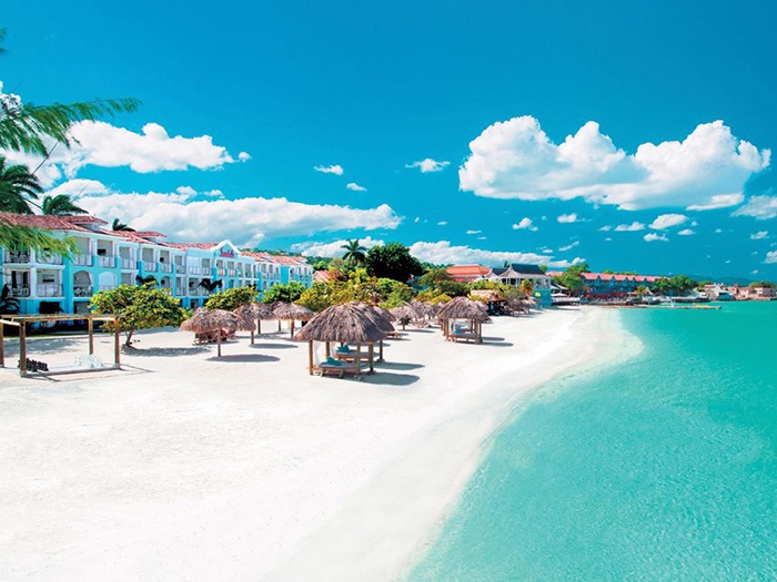 Sandals Montego Bay Jamaica resort overlooking white sand beach and crystal blue ocean
